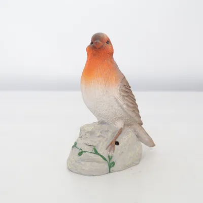 Figurine en porcelaine (Robin) de Robin
