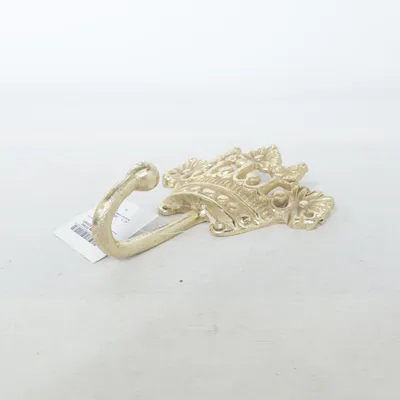 Hängare (Guldfärgad) från Unser