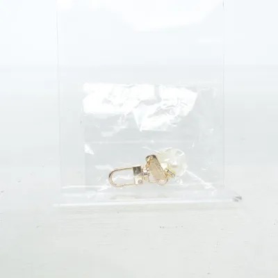 Charm (Gold) Unknown metal