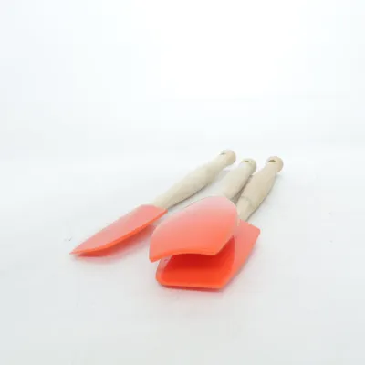 Bowl scraper (Orange, Brown) from Le Creuset