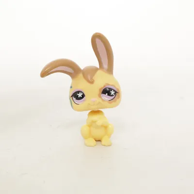 Toy figurine (Yellow, Brown, Pink) from Hasbro