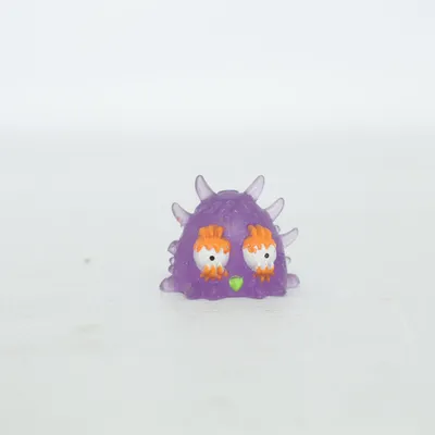 Toy figurine (Purple, Orange, Green) from Moose