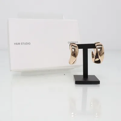 Örhängen (Guldfärgad) från H&M Studio Okänd metall