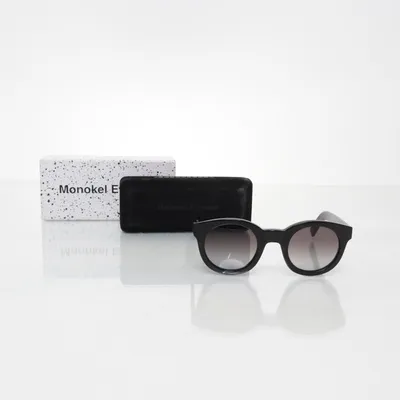 Sunglasses (Black) from Monokel Eyewear