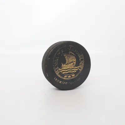 Hockey puck (Black, Gold) from Svenska Ridsports Förbundet