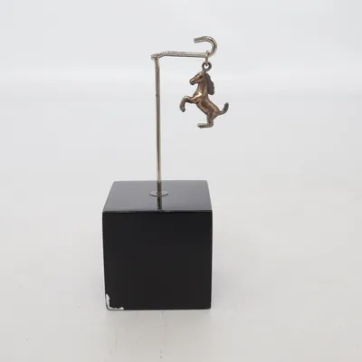 Charm (Silver) Unknown metal