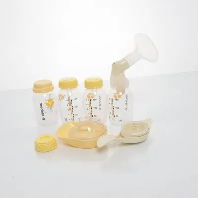 Bröstpump (Vit, Gul) från Medela