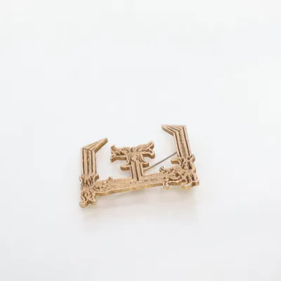 Brosch (Guldfärgad) Okänd metall