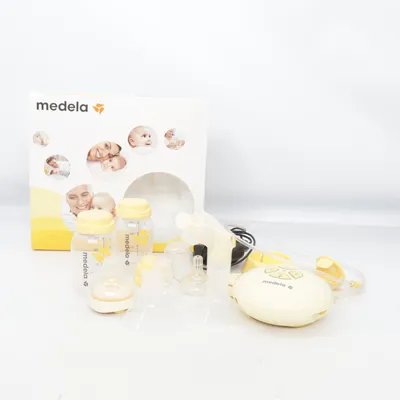 Bröstpump (Vit, Gul) från Medela