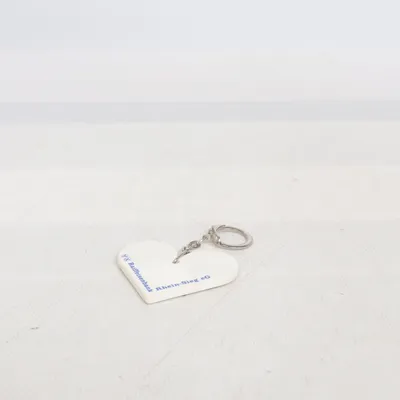 Porte-clés (Blanc, Bleu) de Raiffeisen Wohn Bausparen