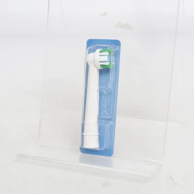 Toothbrush head (White, Green) from Oral-B