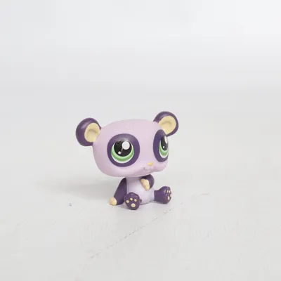 Toy figurine (Purple, Yellow, Green) from Littlest Pet Shop