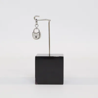 Charm (Silver) from Fossil Unknown metal