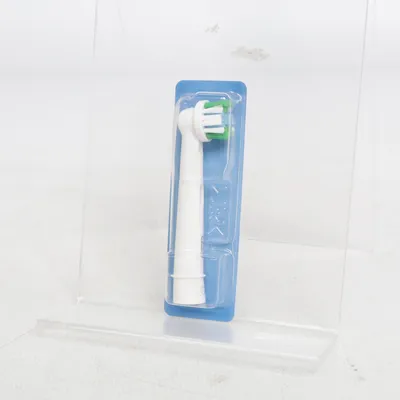 Toothbrush head (White, Green) from Oral-B