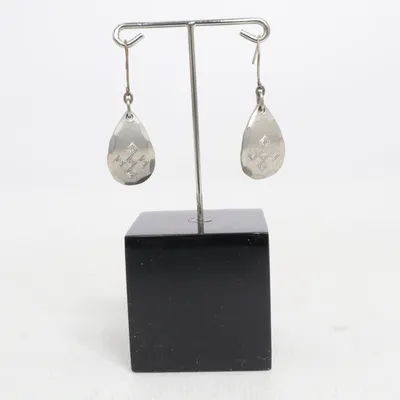 Boucles d'oreilles (Argent) de Tenn Métal inconnu