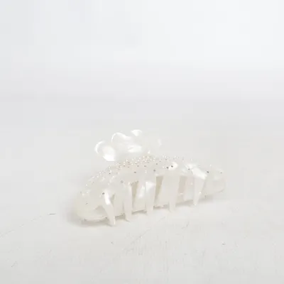 Hair clamp (sui ava • helle bright pearly • hair claw • hair clip • claw clip • pearl • pearlescent • iridescent • translucent • flower • floral • rhinestones • embellished • minimalist • scandinavian • hair accessory) from Sui Ava