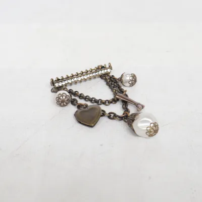 Broche (Marron) Métal inconnu