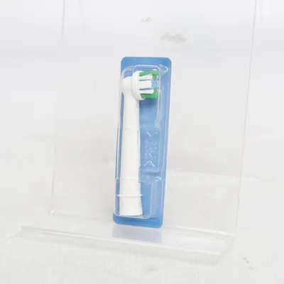 Toothbrush head (White, Green) from Oral-B