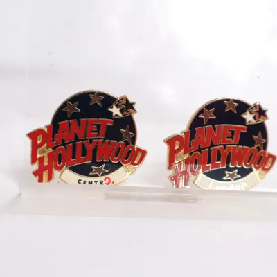 Brosch (Svart, Röd, Guldfärgad) från Planet Hollywood Okänd metall