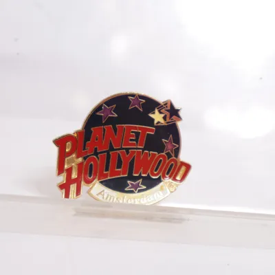 Brosch (Blå, Röd, Guldfärgad) från Planet Hollywood Okänd metall