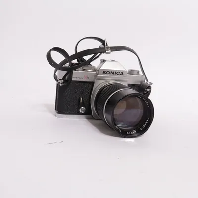 Analog systemkamera (Autoreflex T3) från Konica