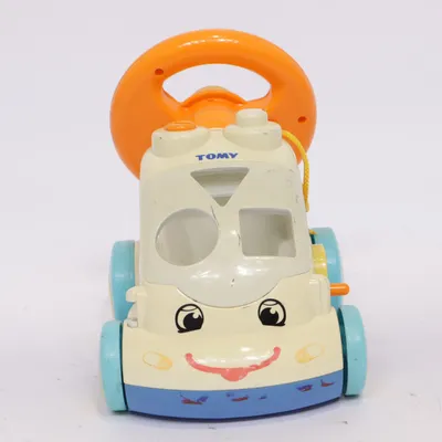 Activity toy (Beige, Orange, Blue) from Tomy