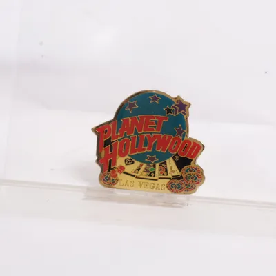 Brosch (Guldfärgad, Flerfärgad) från Planet Hollywood Okänd metall