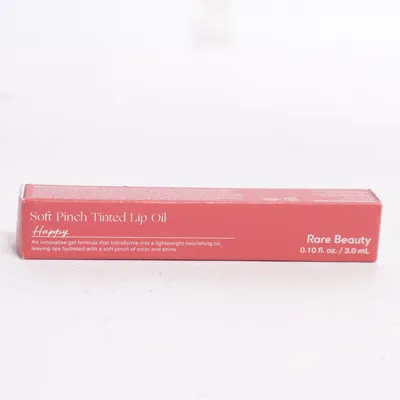 Lip gloss (Soft Pinch Tinted Lip Oil) from Rare Beauty