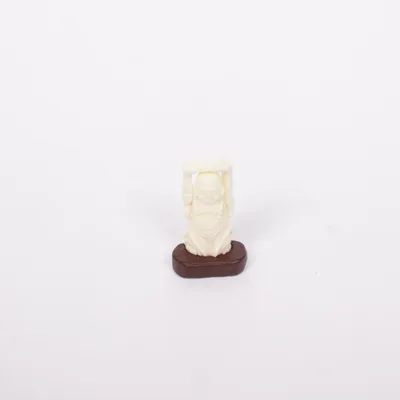 Figur (Buddhistische Figur, glücksbringer handgeschnitzter Knochen auf holzsockel!)