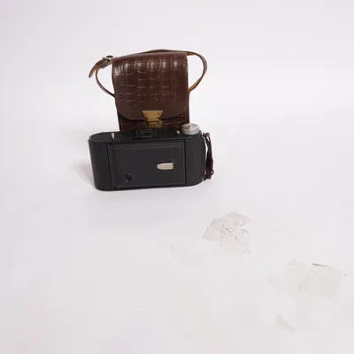 Analog compact camera from froth