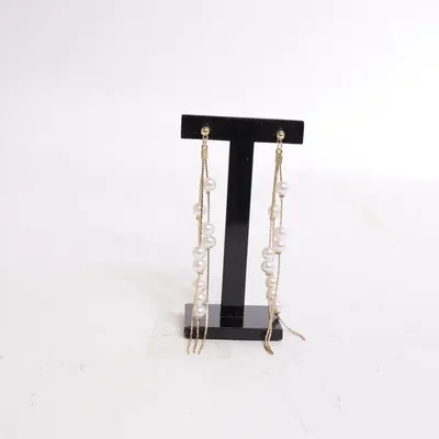 Earrings (Gold, White) from Ting Unknown metal