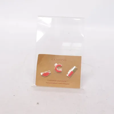 Tilbehør (Rød, Guld) fra Clarins