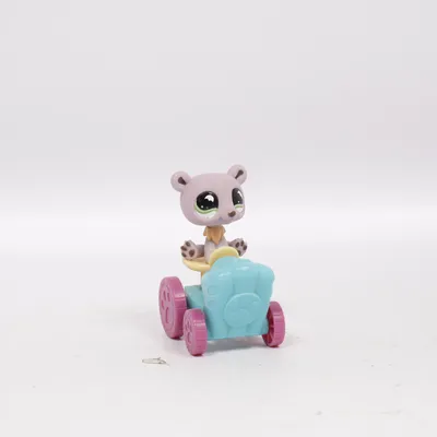 Toy figurine (Purple, Blue, Yellow) from Littlest Pet Shop