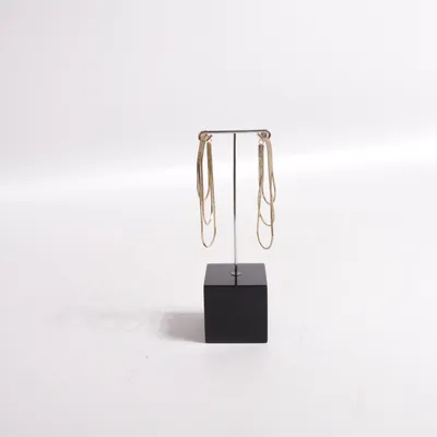 Boucles d'oreilles (Or) de Tosh Métal inconnu
