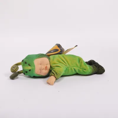 Puppe (Grün, Gelb, Schwarz) von Anne Geddes