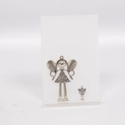 Charm (Silver) Unknown metal