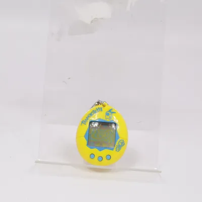 Elektroniskt spel (Gul, Blå) från Tamagotchi