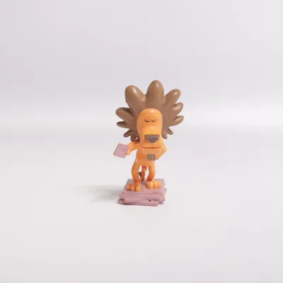 Toy figurine (Orange, Brown, Purple) from Tonies