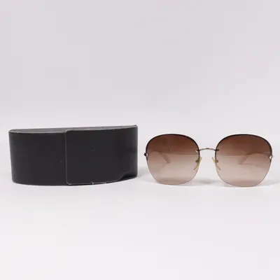 Sunglasses (SPR 53N) from Prada