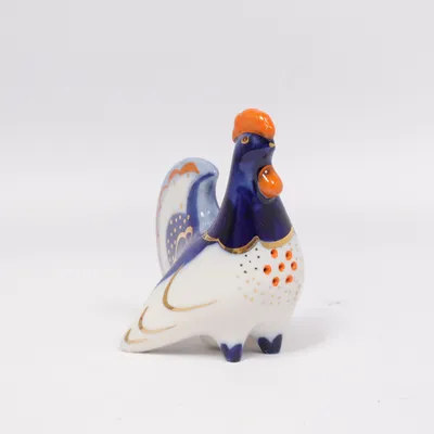 Figurine (Blue, White, Orange)
