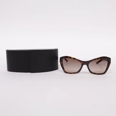 Sunglasses (SPR 07X) from Prada