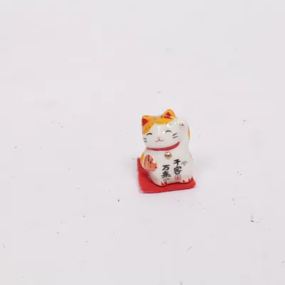 Figurine en porcelaine (Maneki Neko)