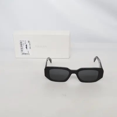 Glasögon (SPR 17W) från Prada
