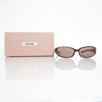 Sunglasses (SMU05D) from Miu Miu