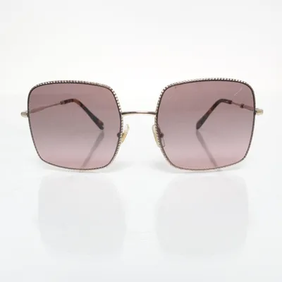 Sunglasses (SMU 61V) from Miu Miu