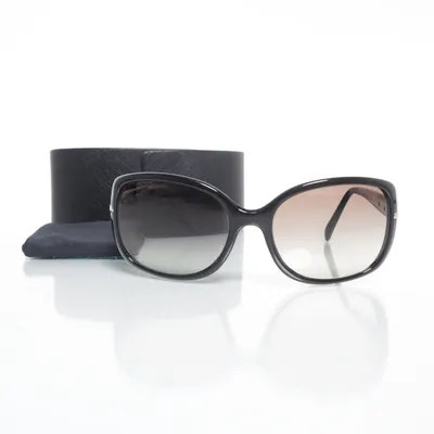 Solglasögon (SPR08O) från Prada