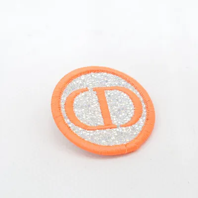 Pin (Orange, Sølv) fra Christian Dior Parfums Ukendt metal