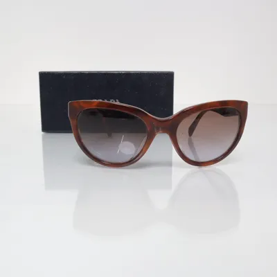 Solglasögon (SPR05P) från Prada