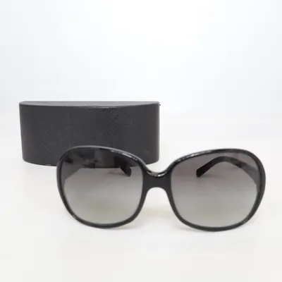 Sunglasses (SPR26L) from Prada