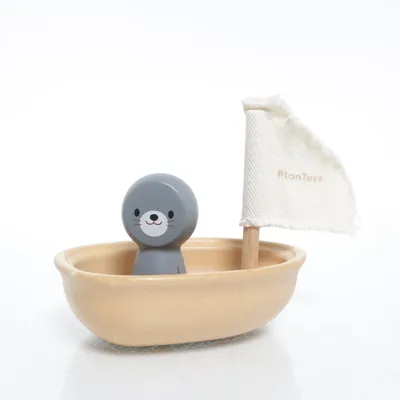 Activiteitenspeelgoed ( Segelbåt i trä med säl) van Plan Toys